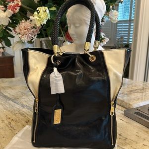 Bagley Mishka genuine, leather handbag. NWT